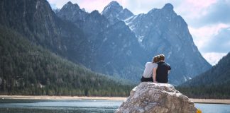 Couple-overlooking-lake