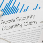 Close up of Social Security Disability Claim Form with writing h