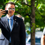 Jack Posobiec waits for Michael Flynn outside Federal court, Washington, USA – 10 Jul 2018